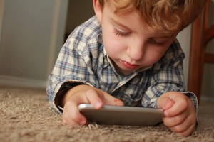 What Screen Time Does to a Kids Brain: By Cynthia Harvey - Featured Image